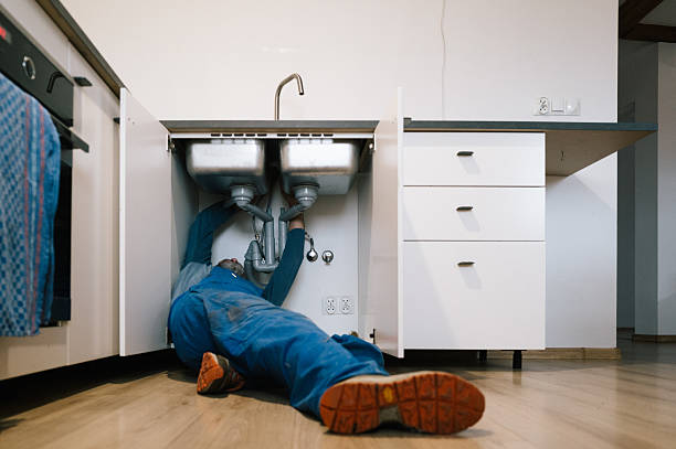 Professional Drain Cleaning technician working in Merton, WI